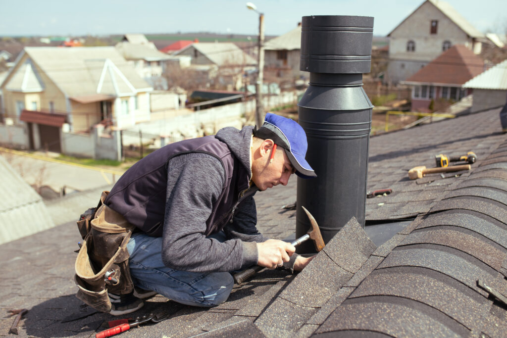 Roof Repairman during a Roof Inspection in Maryland